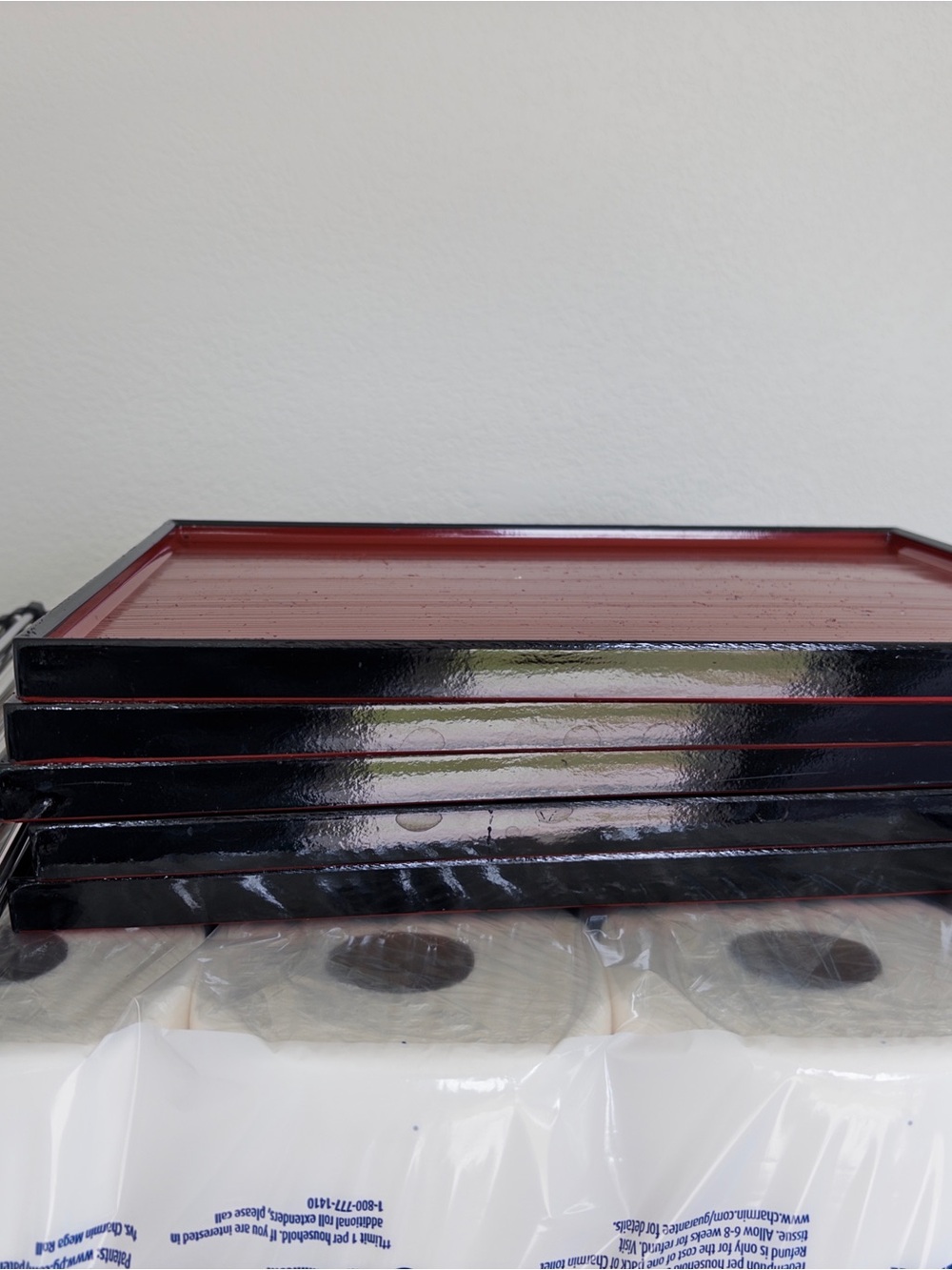 Trays on shelf